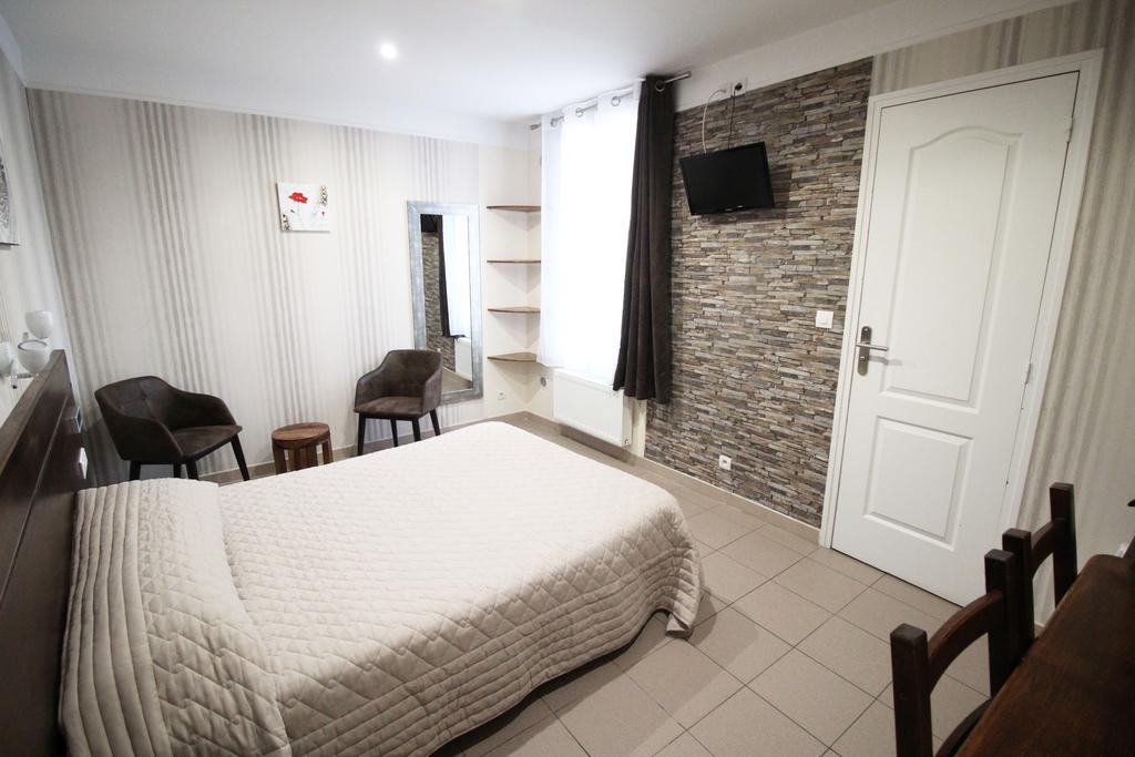 Hotel des Pyrénées París Habitación foto